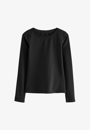 Sort langærmet top lavet af glat, strækbart stof. Har en rund halsudskæring og sidespalter i kanten for ekstra komfort.