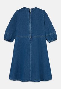 Blue denim dress with a flared silhouette, elbow-length puff sleeves, and a back zipper closure. Features stitched seams and a smooth texture.
