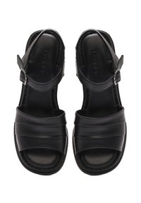 Black leather sandals with wide straps, open toe design, adjustable buckle closure, and textured soles for traction.