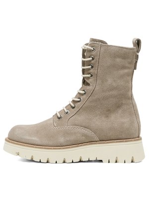 Beige suede ankle boot with a rounded toe, lace-up front, metal eyelets, and a textured white rubber sole featuring a rugged tread pattern.