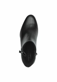 Bottines noires en cuir lisse, avec un bout arrondi, une fermeture éclair sur le côté et des accents en métal argenté. L'intérieur est doublé de tissu noir.