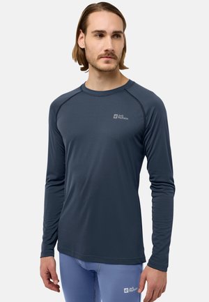 Langärmliges, marineblaues Sportshirt aus leichtem Stoff mit Rundhalsausschnitt und Flachnahtnähte. Mit einem Logo auf der Brust.