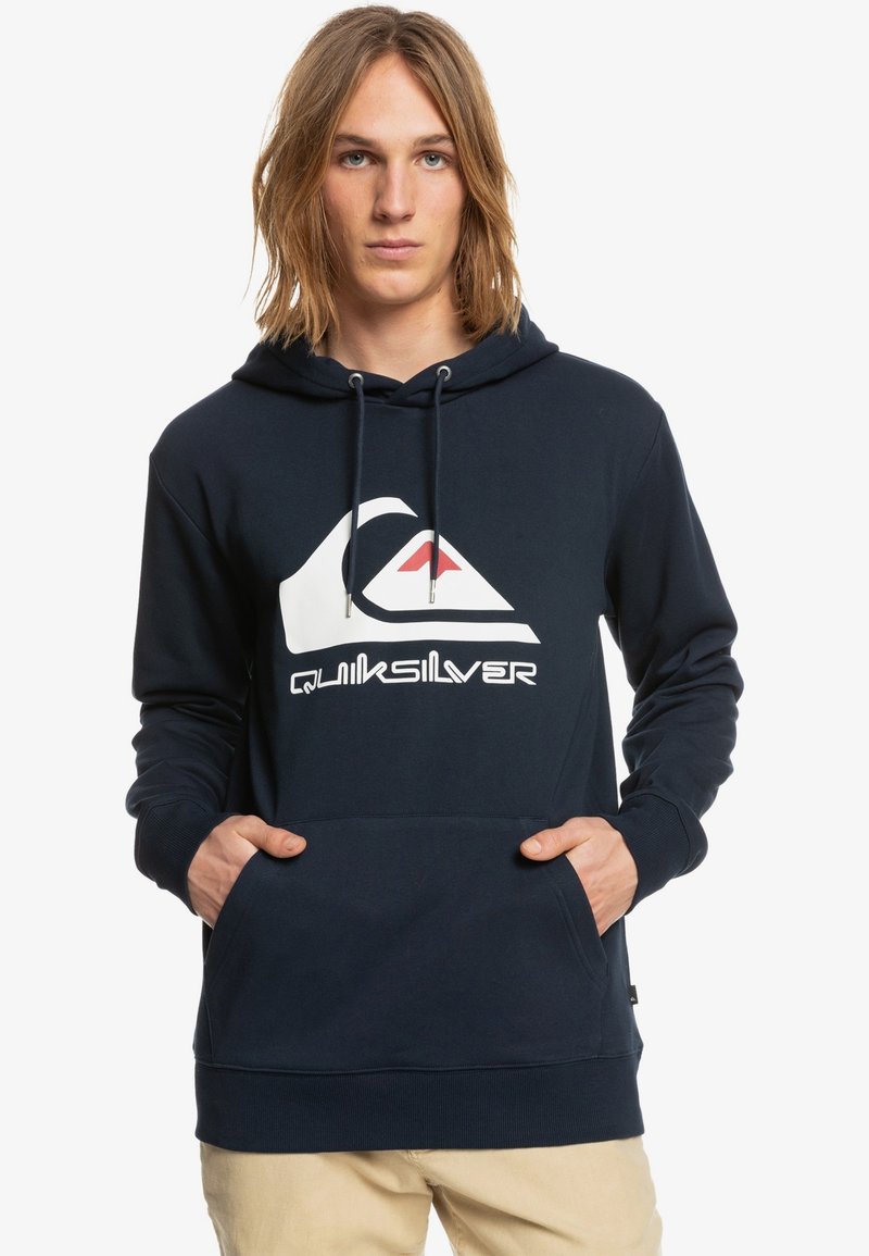Navy blue hoodie made of cotton blend, featuring a large white Quiksilver logo and red accent. Includes front pocket and drawstring hood.