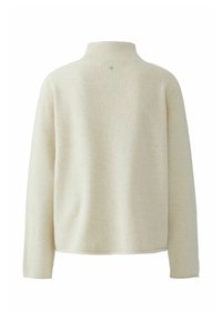 Cremefarbenes Sweatshirt mit hohem Kragen, gerippter Textur und langen Ärmeln. Einfaches Design, keine Muster oder akzentuierenden Elemente sichtbar.