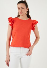 Apdrukāts T-krekls - coral