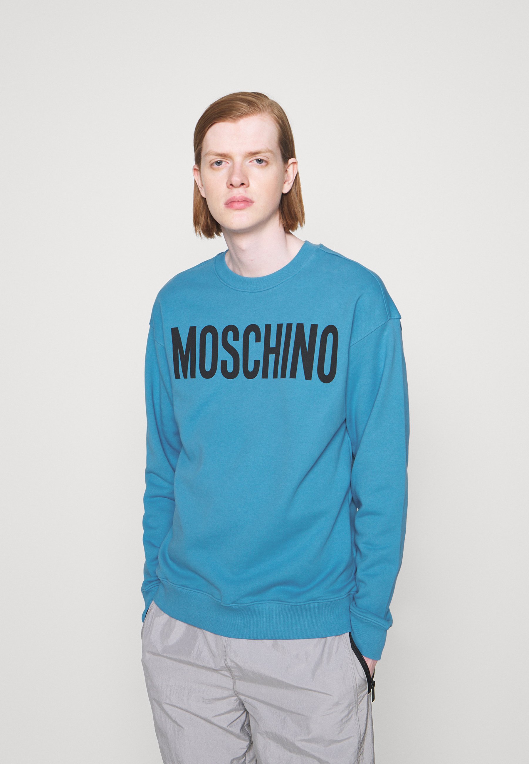 blue moschino sweatshirt