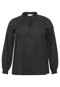 Blouse noire avec un motif texturé de petits points, un col froncé et des manches longues avec des poignets élastiques. Elle présente un décolleté en V.