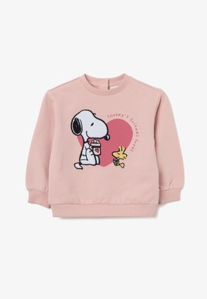 Sudadera rosa con un diseño bordado de Snoopy y Woodstock con un corazón y el texto "El trato de los amigos de Snoopy." Puños y dobladillo de canalé.