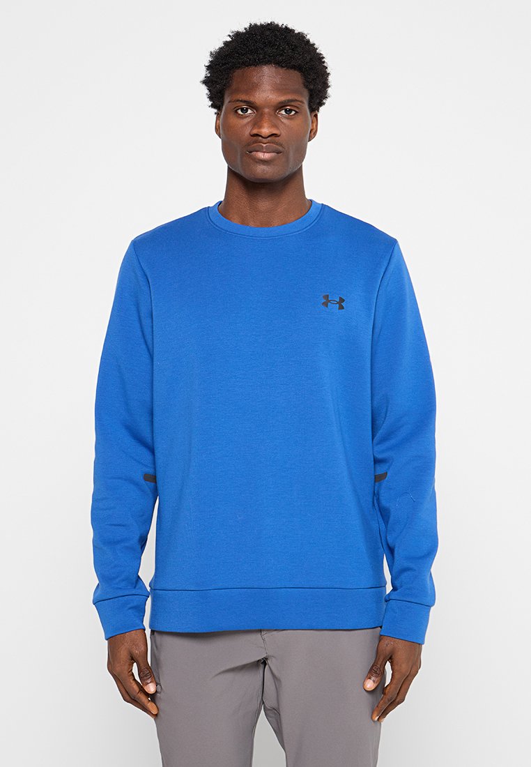 Blue sweatshirt made of fabric, featuring long sleeves, a crew neckline, and a small black logo on the chest. Smooth texture and loose fit.