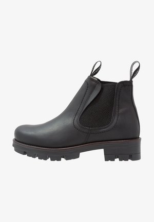 Botte Chelsea en cuir noir avec panneaux latéraux élastiques, languettes de traction, semelle en caoutchouc texturée et bout arrondi avec une adhérence robuste.