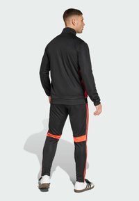 adidas Performance ADIDAS PERFORMANCE TIRO 25 ESSENTIALS TRACK SUIT - Trainingsanzug - black   lucid red