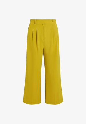 Pantalons larges jaunes avec plis et taille ajustée. Présente une texture lisse et une longueur crop, idéale pour de nombreuses options de style.