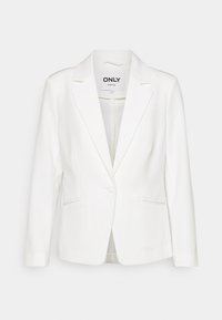 Vit kavaj med en strukturerad silhuett, slagkrage, knappstängning med en enda knapp och två sidofickor. Tillverkad av slät tyg.