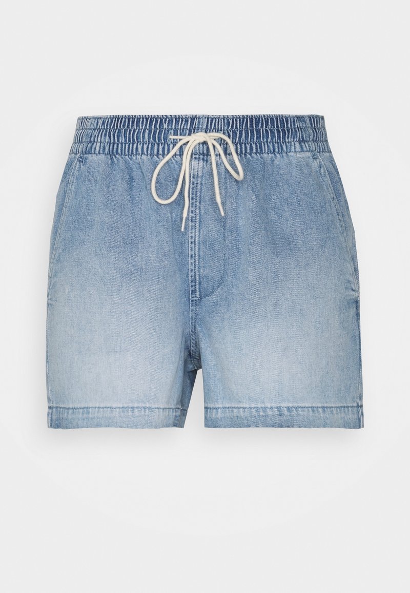Jeansshorts i en ombre-ljusblå färg, elastisk midja och dragsko stängning. Har en klassisk passform och en ren fåll.