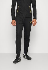 Nike Performance M NK DRY ACD21 TRK SUIT K - Fato de treino - black/laser orange
