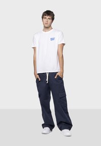 Kaotiko HAPPY PLACE UNISEX - Tričko s potlačou - ivory