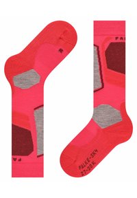 Calze per bambini di un vivace rosa con modelli geometrici grigi e rossi. Realizzate in materiale morbido con punte e talloni rinforzati per una maggiore durata.