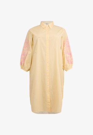 Geel gestreepte blousejurk met knopen, een kraag en pofmouwen met roze bloemenborduursel.