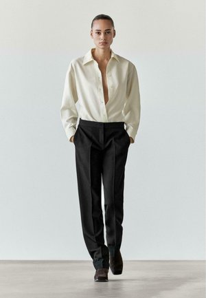 Pantalon classique - black
