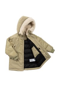 Giacca puffer khaki con cappuccio foderato in pelliccia. Presenta fodera interna nera, chiusura frontale con zip, polsini elasticizzati e tasche laterali. Etichette di cura visibili all'interno.