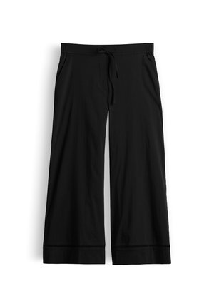 Schwarze, weit geschnittene Hose mit elastischem Kordelbund und abgesteppten Säumen, flach auf weißem Hintergrund gezeigt.