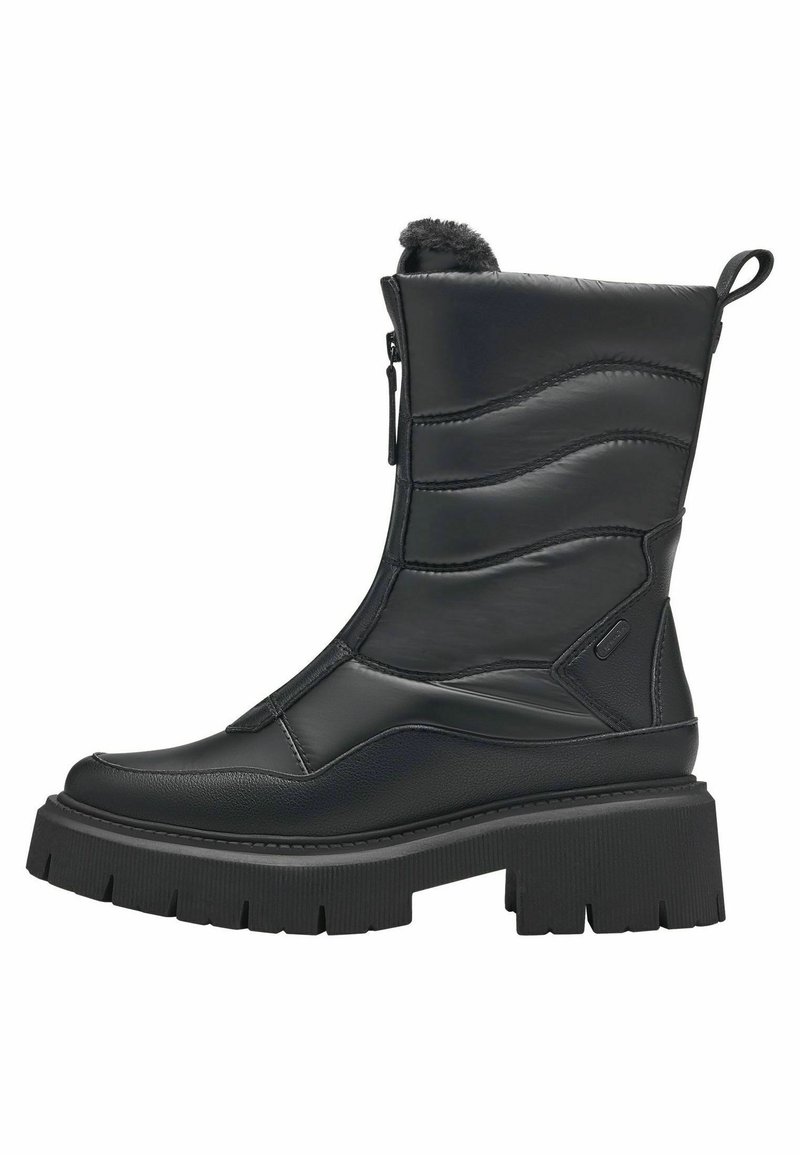 Bottines noires avec un dessus synthétique texturé, un col rembourré, une fermeture éclair sur le côté et une épaisse semelle en caoutchouc avec des profondes rainures pour une adhérence optimale.