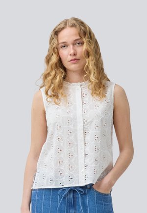 White sleeveless blouse with intricate embroidered pattern, rounded neckline, front button closure, and slightly relaxed fit.