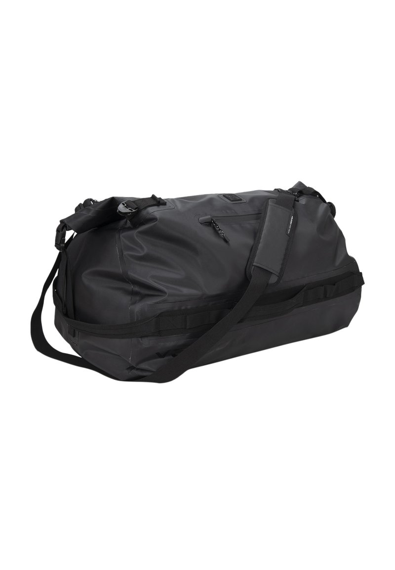 Black duffel bag made of waterproof material, featuring a rounded shape, adjustable shoulder strap, and zippered pockets for storage.