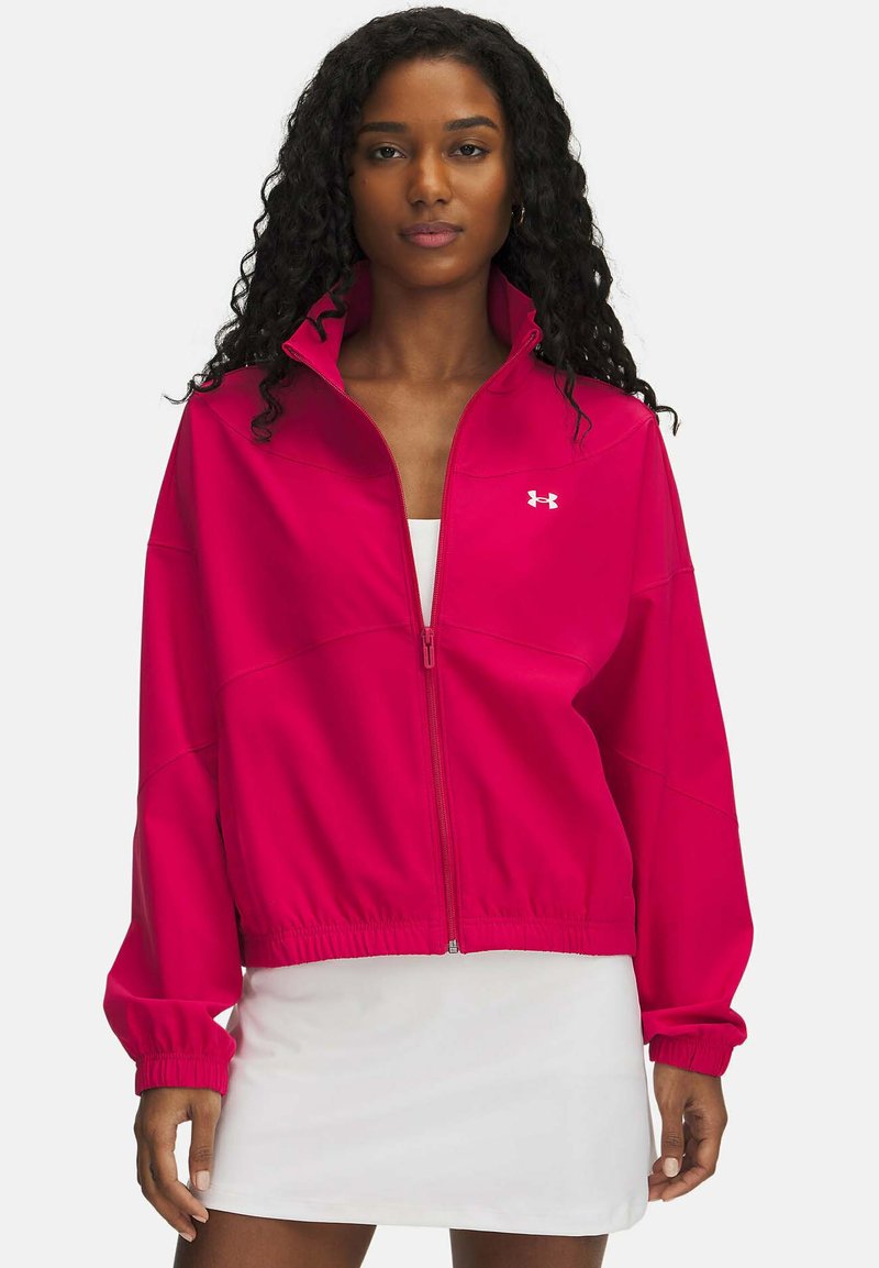 Fuchsia zip-up jacket with a high collar, elastic cuffs, and a cinched hem. Features a small white logo on the chest. Smooth fabric texture.