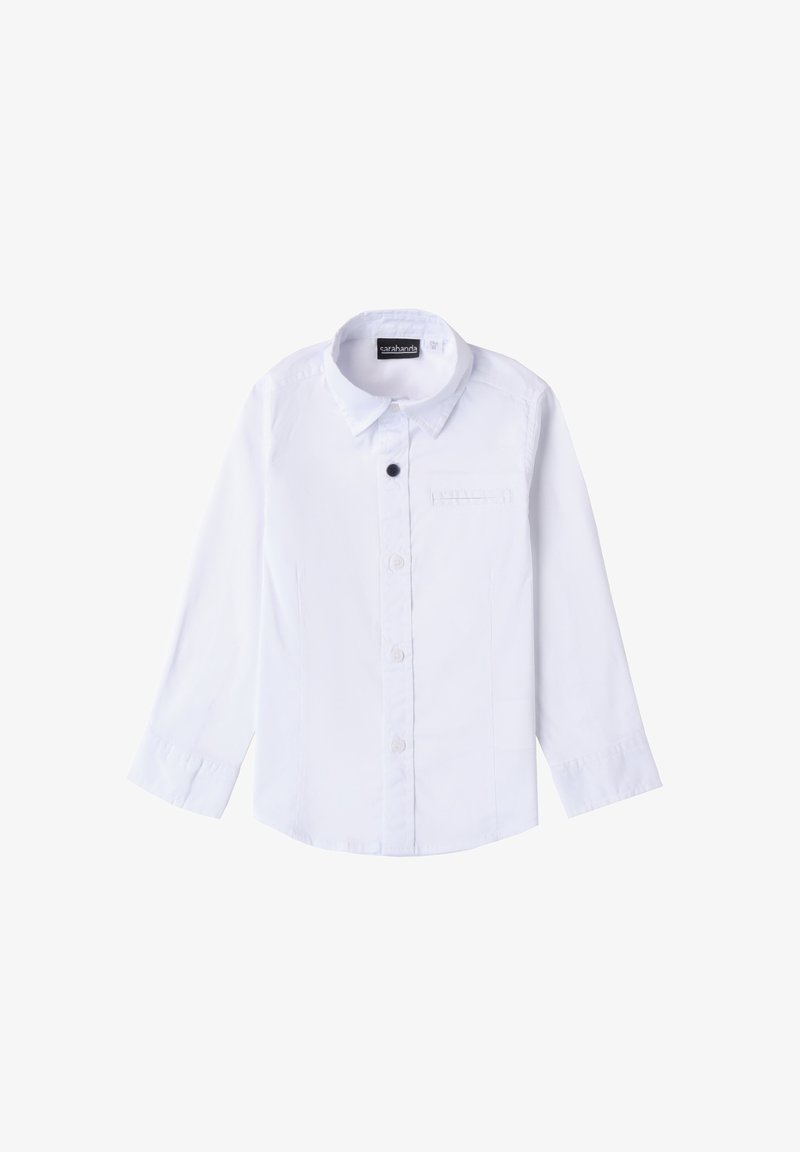 Camicia bianca a maniche lunghe con colletto a punta, chiusura frontale con bottoni, singolo taschino sul petto e tessuto di cotone morbido.