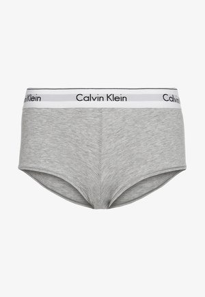 Gray cotton briefs with a white waistband featuring "Calvin Klein" branding in black. Smooth texture, fitted design, and mid-rise shape.