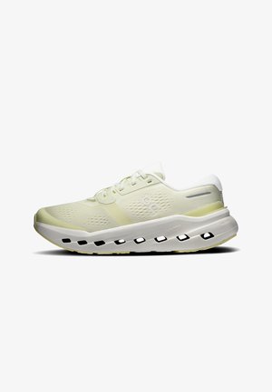 Scarpa da ginnastica verde chiaro e bianca con tomaia traforata, suola imbottita con ritagli rettangolari e logo sul lato e sul tallone.