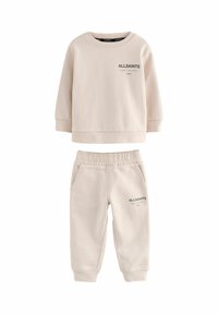 Beiger Sweatshirt und passende Jogginghose aus weichem Material, mit gerippten Bündchen und einem Gummizug an der Taille, mit schwarzem "ALLSAINTS"-Logo.