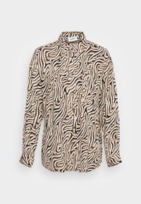 Camisa de manga longa com um padrão ondulado em preto, bege e creme. Apresenta um fecho com botões na frente, colarinho e um único bolso no peito.