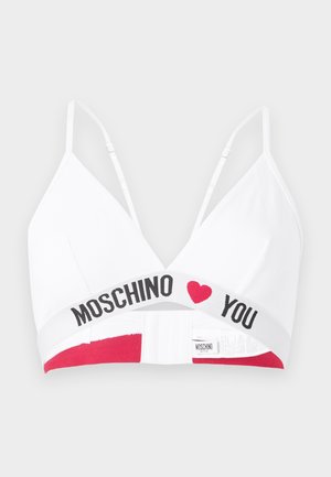 Soutien-gorge blanc à bretelles réglables, nom de la marque Moschino, avec un cœur rouge imprimé sur la bande élastique sous le buste.
