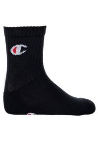 Calzino sportivo nero con bordo a coste, caratterizzato da un logo bianco con accenti rossi. Il calzino ha una texture liscia e un design alto fino alla caviglia.