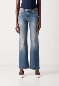Tommy Jeans CLEO - Bootcut jeans - denim dark