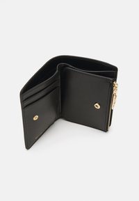 Black leather wallet with a zip closure, multiple card slots, and a gold-tone snap button. Smooth texture and compact design.
