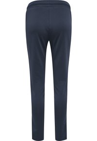 Marina atletiska byxor med en slät textur, smal passform och elastisk midja. Har minimalt med sömmar och ingen synlig metall eller detaljer.