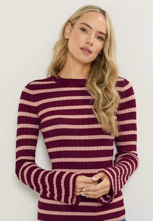 - Sweter