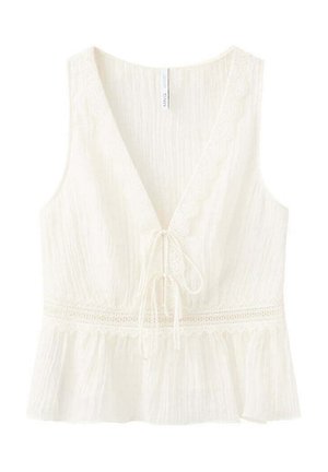 Sleeveless white blouse with V-neck, lace trim along neckline and waist, tie closure at front, and ruffled hem.