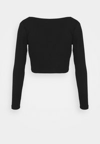 Pull court noir à manches longues avec texture côtelée, présentant un large décolleté et une coupe ajustée. Aucun motif ni accent visible.