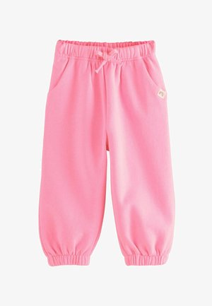 Lyserøde sweatpants lavet af blødt stof, med elastisk talje med snor, manchetter ved anklerne og sidelommer til opbevaring.