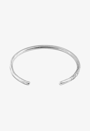 Silver metal cuff bracelet with a smooth, round band and a twisted design detail near one end. Features an open design for easy wear.