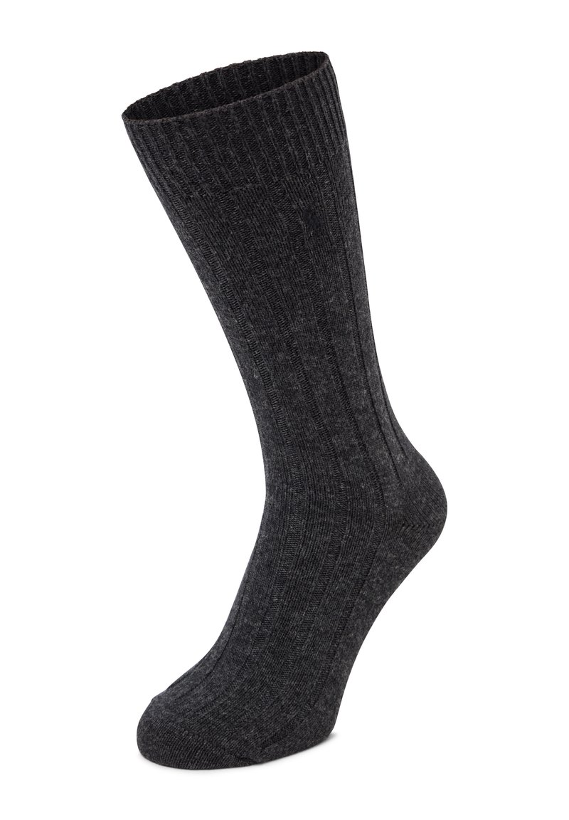 Calza grigia scuro a costine con una forma lunga e affusolata. Realizzata in tessuto strutturato, presenta linee verticali lungo il corpo per un dettaglio aggiuntivo.