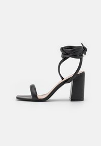 RAID Korolliset sandaalit - black