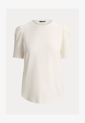 Camiseta blanca de manga corta con cuello redondo, textura suave y hombros ligeramente abullonados. Dobladillo inferior ligeramente curvado.