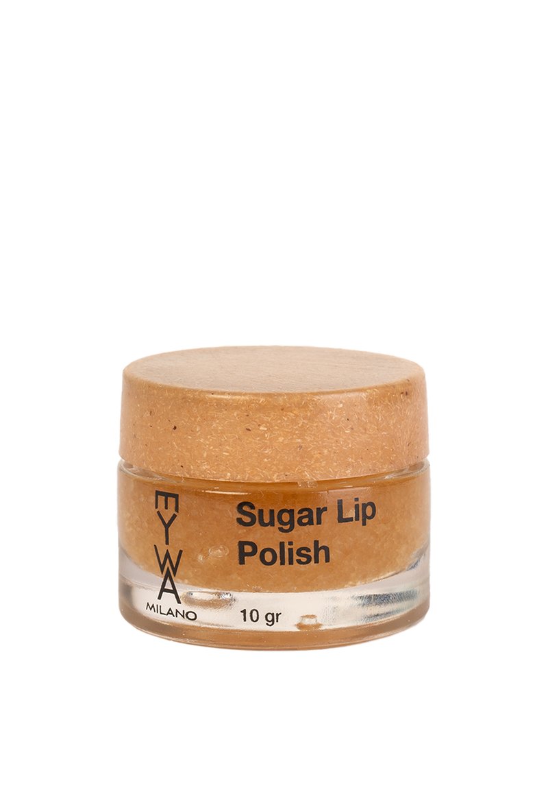 Barattolo di vetro trasparente di scrub labbra al zucchero, con un coperchio di sughero beige. L'etichetta mostra la scritta "Scrub Labbra al Zucchero" e "10 gr" in nero.