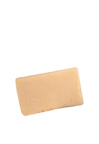 Blocco di cera beige rettangolare con una superficie leggermente ruvida e texturizzata su uno sfondo bianco.