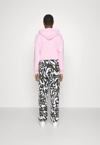 CHIARA FERRAGNI Teplákové kalhoty - white